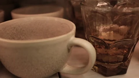 Stack of small minimalist aesthetic ceramic cups for coffee. Stock Footage 320972243
