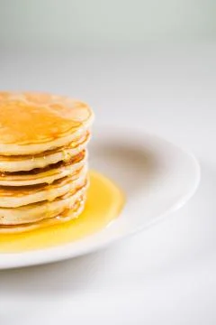 Stack of Small pancakes in syrup Stock Photos