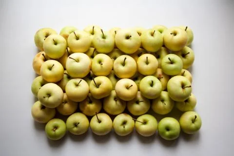 Stack of small white apples from above Stock Photos