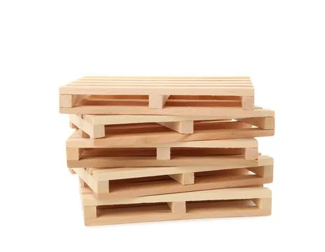 Stack of small wooden pallets on white background Foto stock