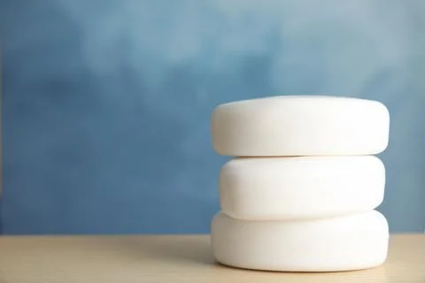 Stack of soap bars on table. Space for text Foto stock