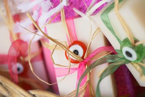 Stack of soap topped with evil eye beads, Stockfoto's