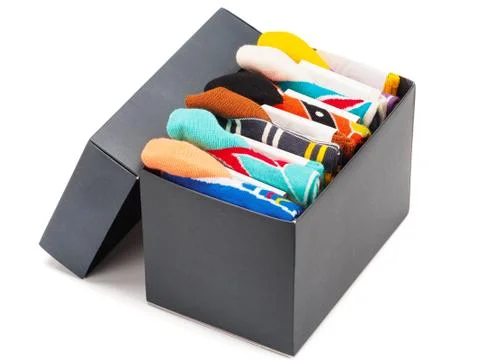 Stack of socks in the box isolated on white background. Stock Photos