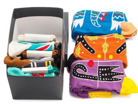 Stack of socks in the box isolated on white background. Stock Photos