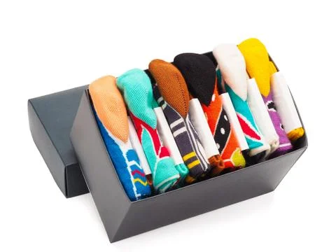Stack of socks in the box isolated on white background. Stock Photos