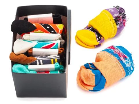 Stack of socks in the box isolated on white background. Stock Photos