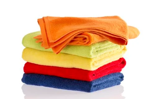 Stack of soft towels in the colors of the rainbow Stock Photos