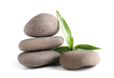 Stack of spa stones with bamboo isolated on white 스톡 사진