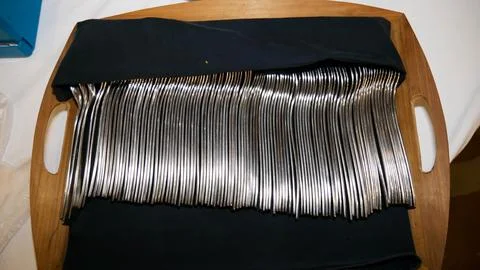 Stack of spoon in restaurant Foto stock