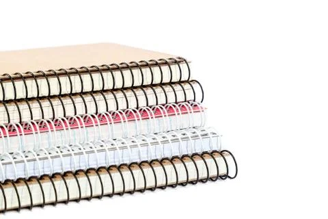 Stack spring notebooks isolated on white background Stock Photos