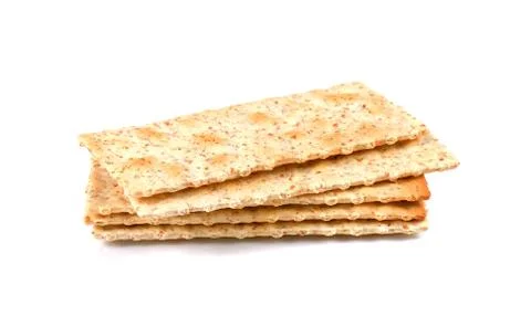 Stack of square crackers isolated on white background. Dry cracker cookies Stock Photos