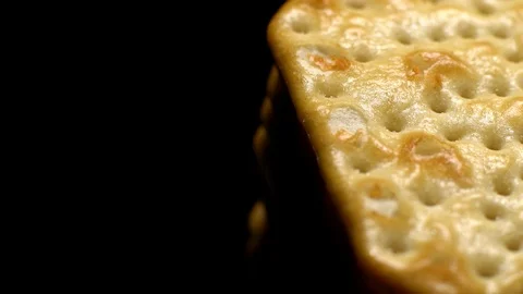 Stack of square crackers in rotation Stock Footage 98749067