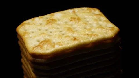 Stack of square crackers in rotation Stock Footage 98749090