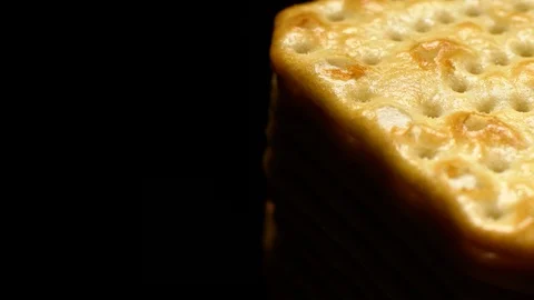 Stack of square crackers in rotation Stock Footage 98749286