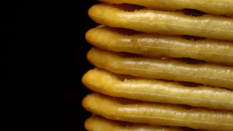 Stack of square crackers in rotation Stock Footage 98749658