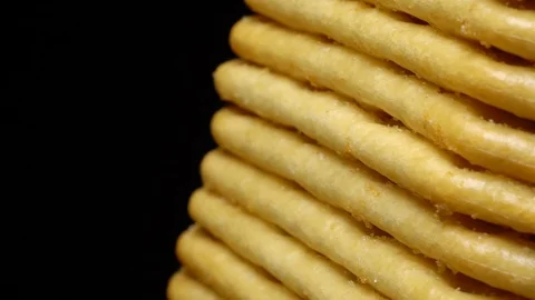 Stack of square crackers in rotation Stock Footage 98749719