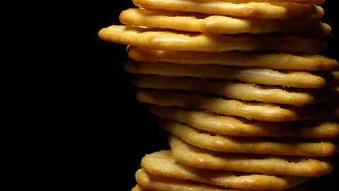 Stack of square crackers in rotation Stock Footage 98750710