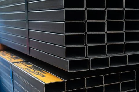 Stack​ of​ square metal pipe background Stock Photos