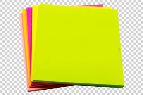 Stack of square neon paper sheets in shades of lime green, yellow, pink. Stock Photos