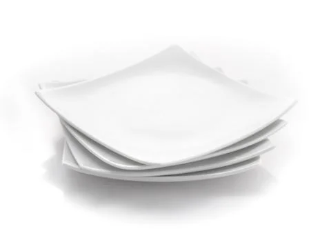 Stack of square plates isolated on a white background Stock Photos