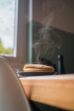 Stack of Steaming Pancakes Viewed from the Bottom Stock Photos
