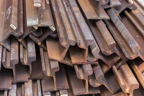 Stack of steel and rusty rail profiles Stock Photos