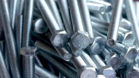 Stack of steel fasteners screws,bolts and nuts for sale 库存影片 201521983