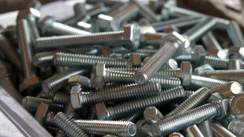 Stack of steel fasteners screws,bolts and nuts for sale Video stock 201522164