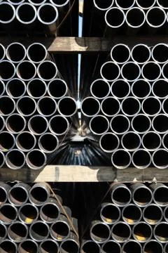 Stack of steel pipes background Stock Photos