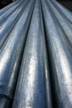 Stack of steel  pipes. Stock Photos