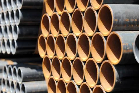 Stack of steel pipes Stock Photos