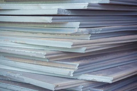 Stack of steel plate, Processing steel plate background. Stock Photos
