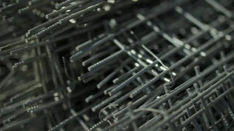 Stack of Steel Reinforcement Mesh for Concrete Construction Stock Footage 317396505