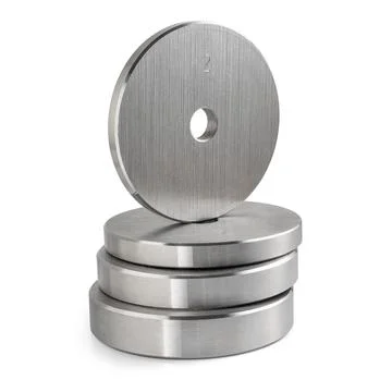 Stack of steel round weight plates for dumbbells isolated on white Stock Photos