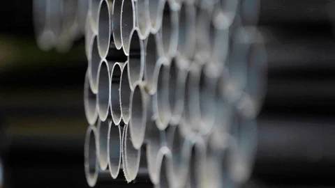 Stack of steel tubes Industrial Stock Footage 91142027