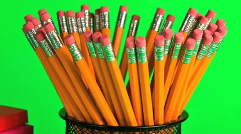 Stack of sticky note paper pads and pencil cup Stock Footage 20544310