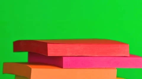Stack of sticky note paper pads Stock Footage