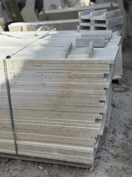 Stack of stone tiles outdoors at construction site, useful as textured back.. 写真素材