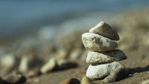 Stack of stones and Sea Splash Stock Footage 96673028