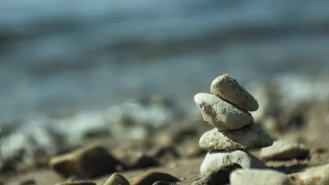 Stack of stones and Sea Splash Stock Footage 96673083