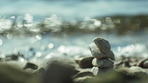 Stack of stones and Sea Splash Stock Footage 96673199