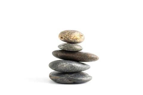 Stack of stones balancing isolated on white background Foto stock