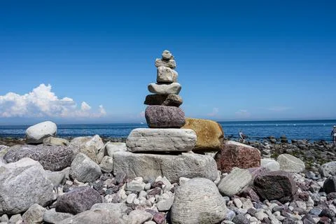 A stack of stones on a beach Foto stock