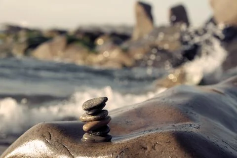 Stack of stones, pebble balance at beach Stock Photos