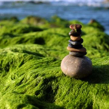 Stack of stones, pebble balance at beach Stock Photos