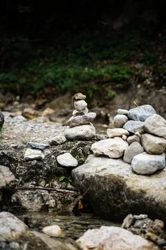 Stack of stones in a river bed Stock Photos