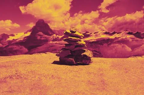 Stack of stones on top of the mountain arranged for meditation. Stock Photos