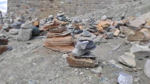 Stack of stones on top of the mountain arranged for meditation. Stock Photos