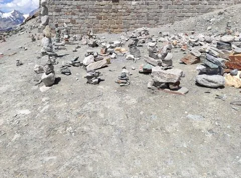 Stack of stones on top of the mountain arranged for meditation. Stock Photos