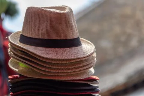 Stack of straw fedora hats Stock Photos